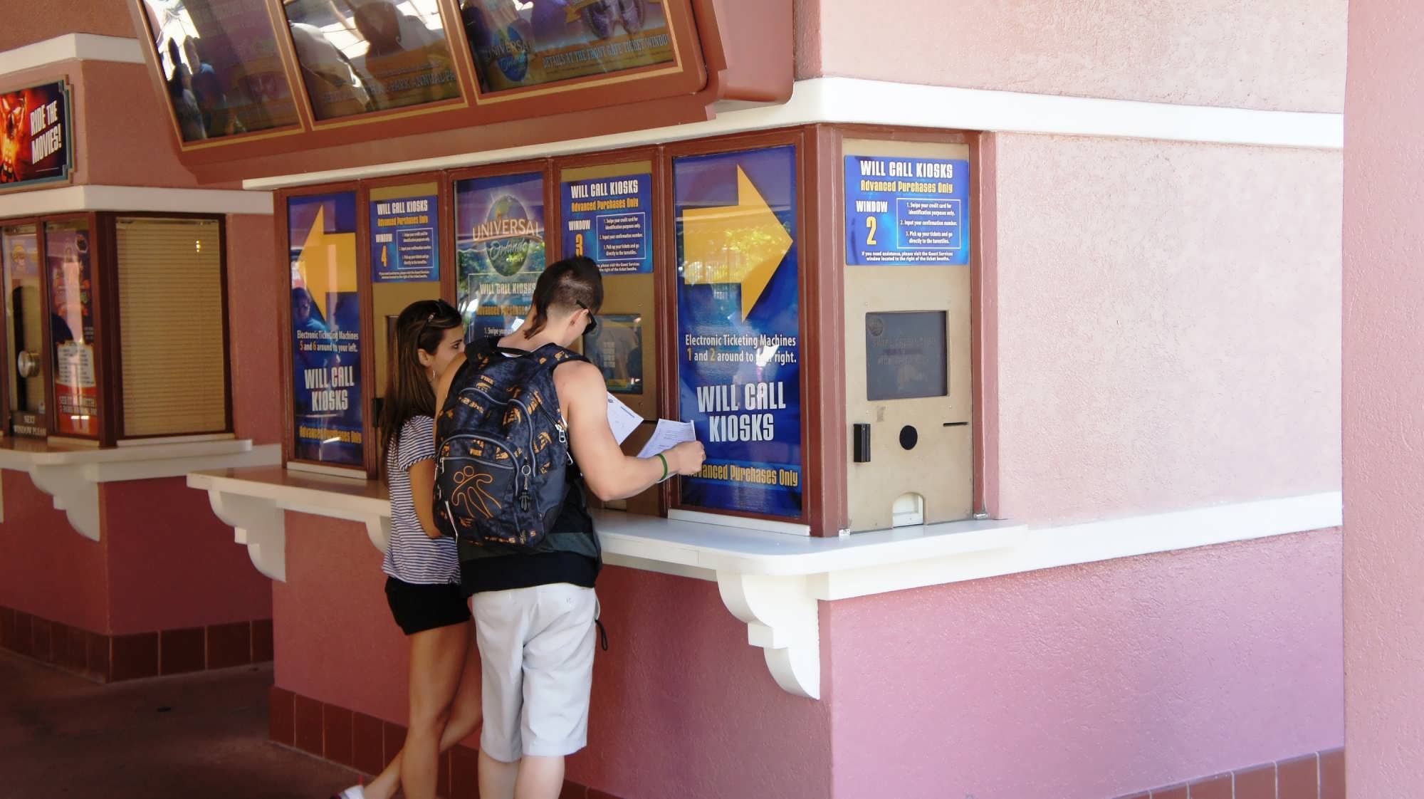 Guests pick up tickets before entering Universal Studios Florida